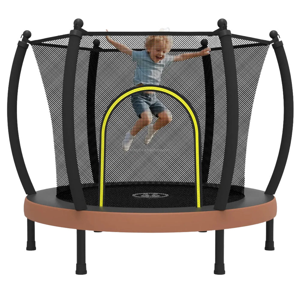Child jumping on a trampoline with safety netting