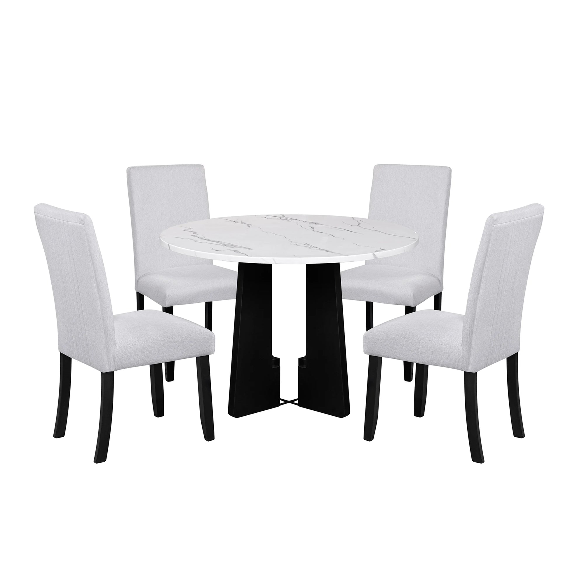 Round dining table with four matching chairs on a white background
